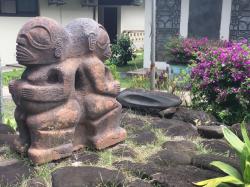 Tiki statues in the Atuona Village 